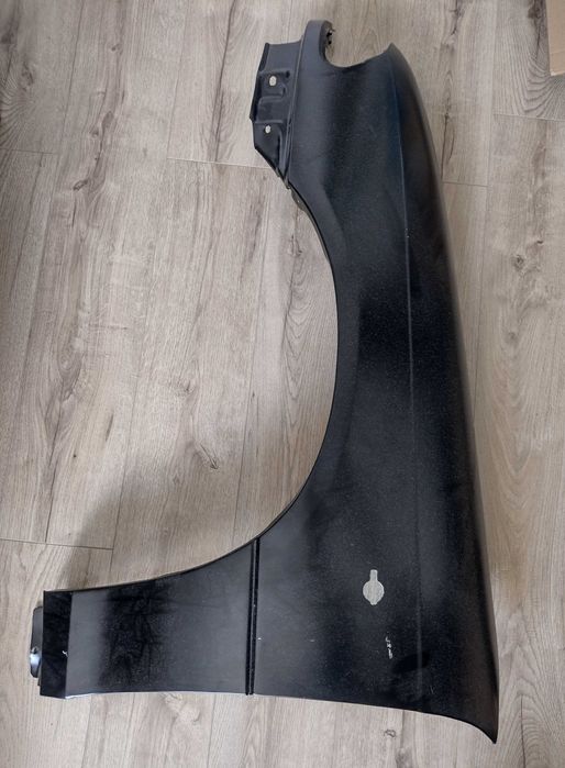 Błotnik przedni lewy Opel Astra F - nowy