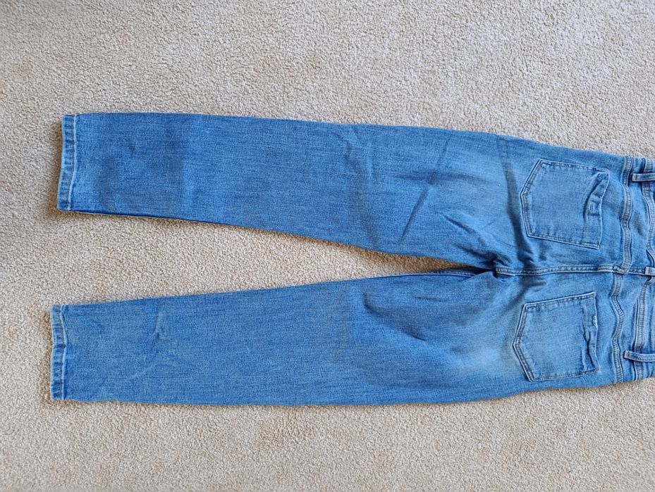 Spodnie jeansowe z dziurami mohito rozm 32