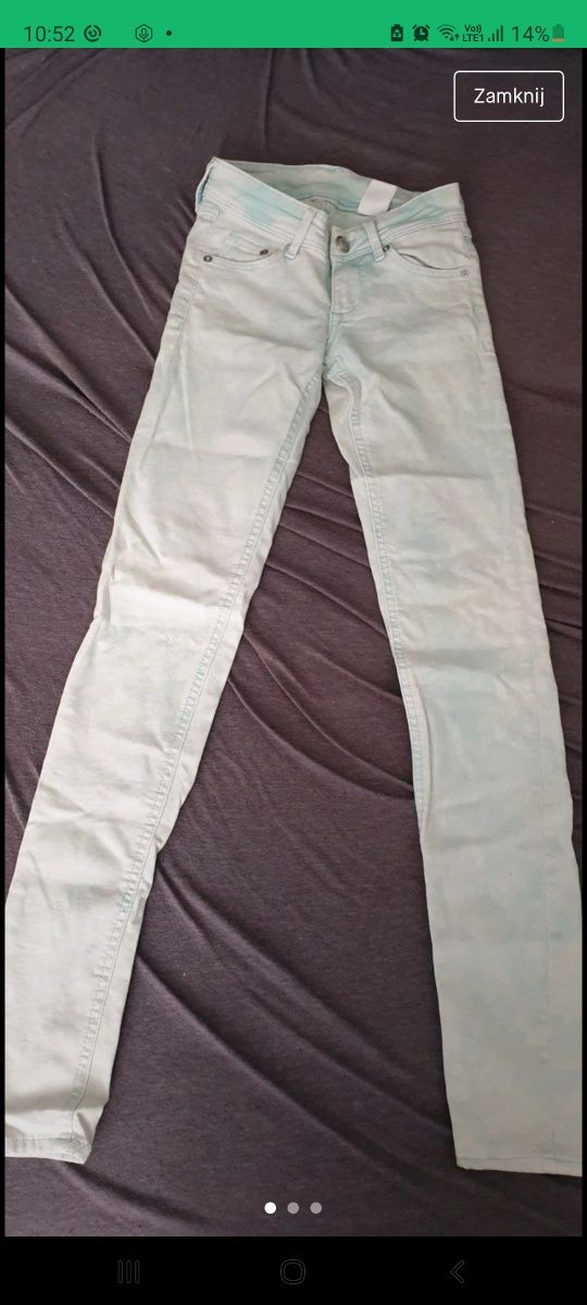H&M spodnie białe z zielonymi przetarciami 24/32