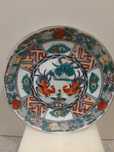 Prato oriental pintado à mão