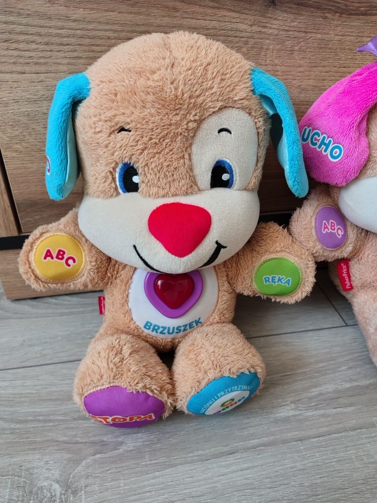 Dwa misie Fisher Price .