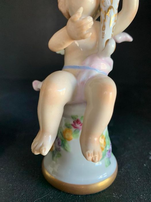 Par de casticais com dois anjinhos da artibus