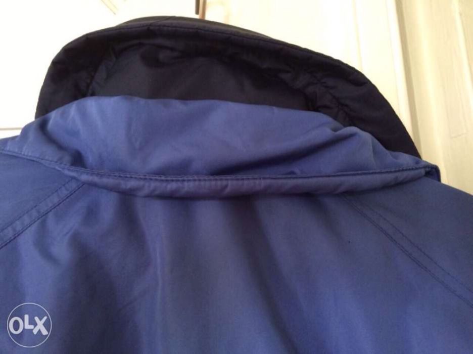 Женская куртка Columbia синего цвета на молнии и пуговицах, с черными