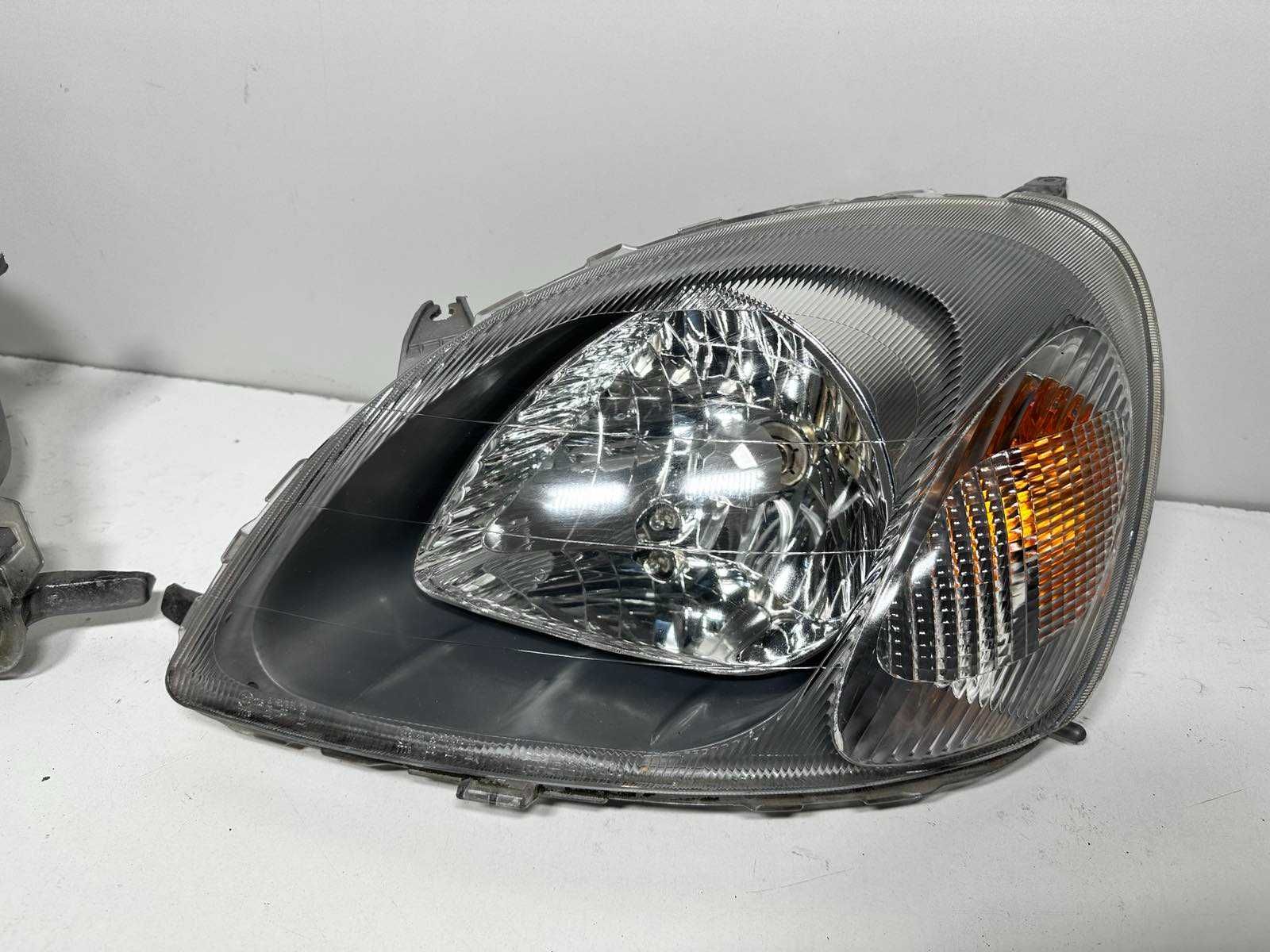 Toyota Yaris I Prawy Lewy reflektor lampa zwykła EUROPA cana za 1 st