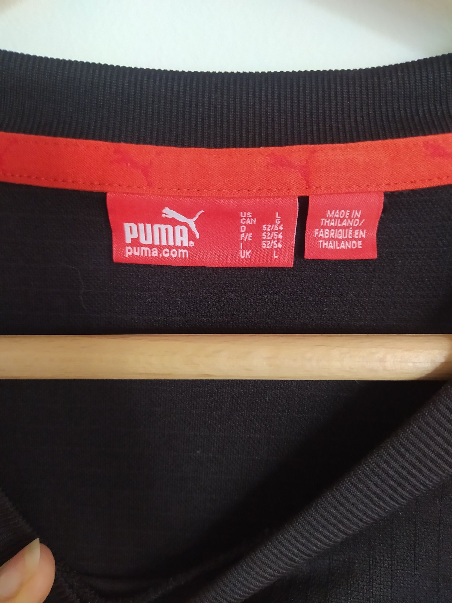 Czarno-biała funkcyjną koszulka Puma. Rozm. L