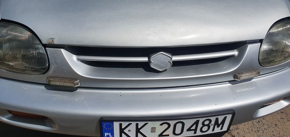 Suzuki Vitara x90 błotnik prawy