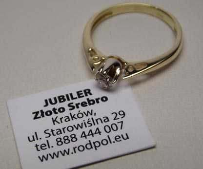 Złoty pierścionek z diamentem brylant 0,18 ct.