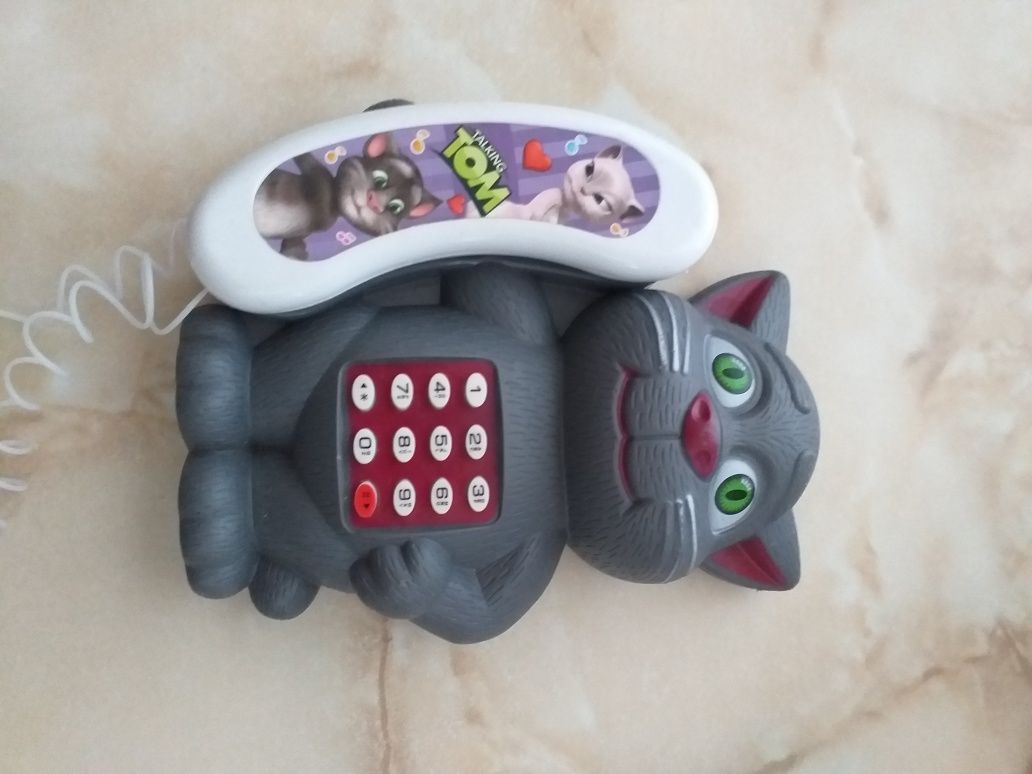 Кот Том . Телефон музыкальный .