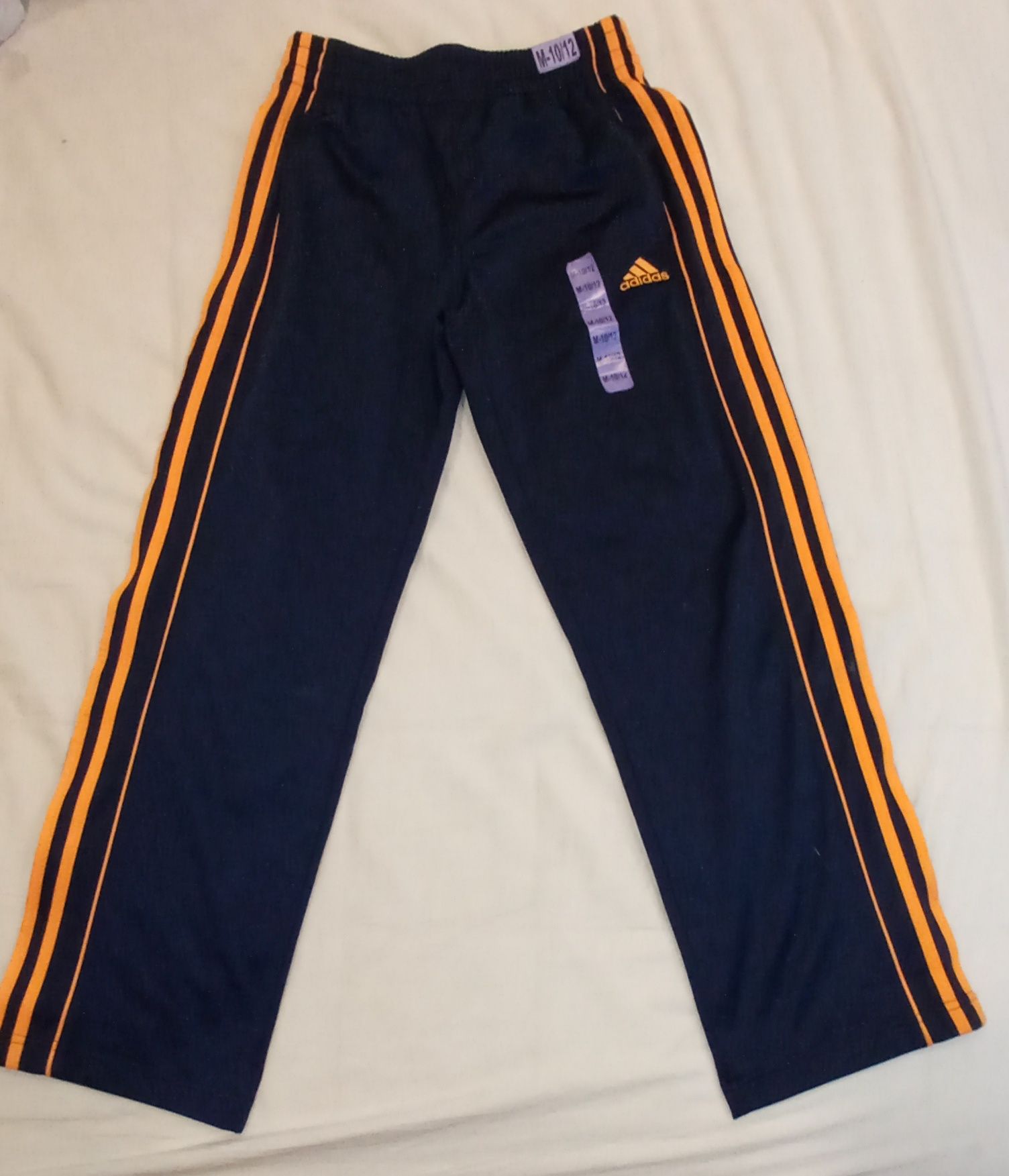 Nowe spodnie dresowe Adidas