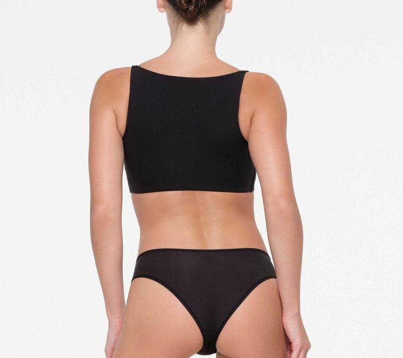 М´який бра Skims