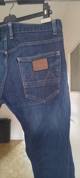 Męskie jeansy CROLL denim, długość nogawki po wewnętrznym szwie 80 cm