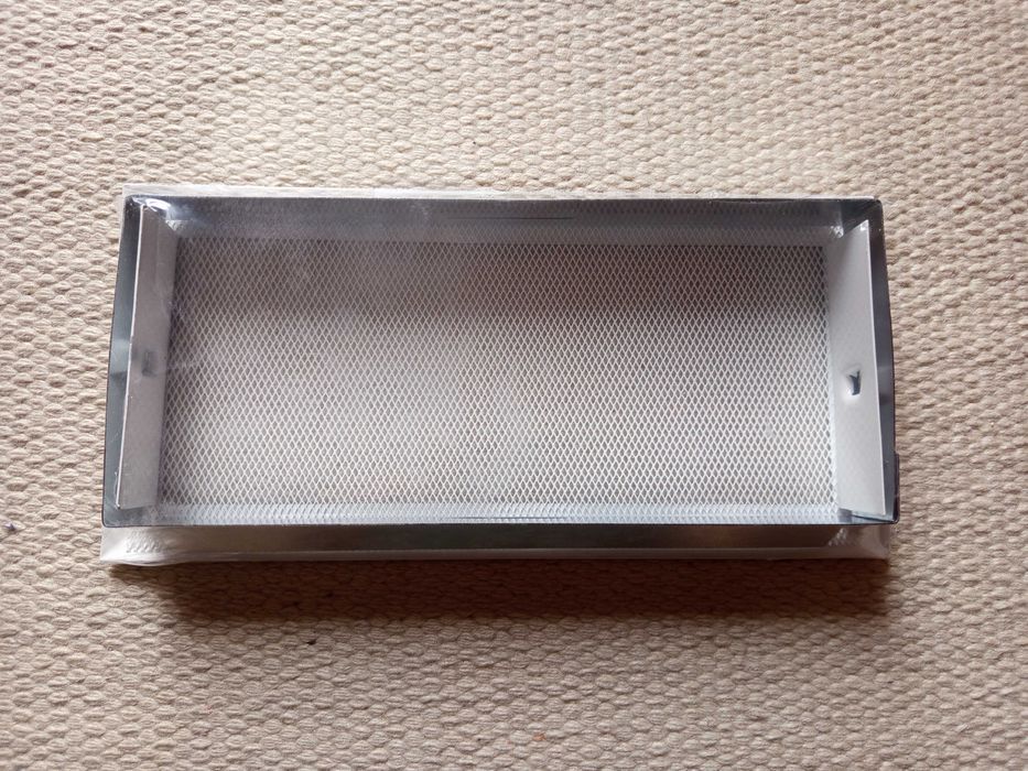 grelha para recuperador de calor ou lareira nova na embalagem