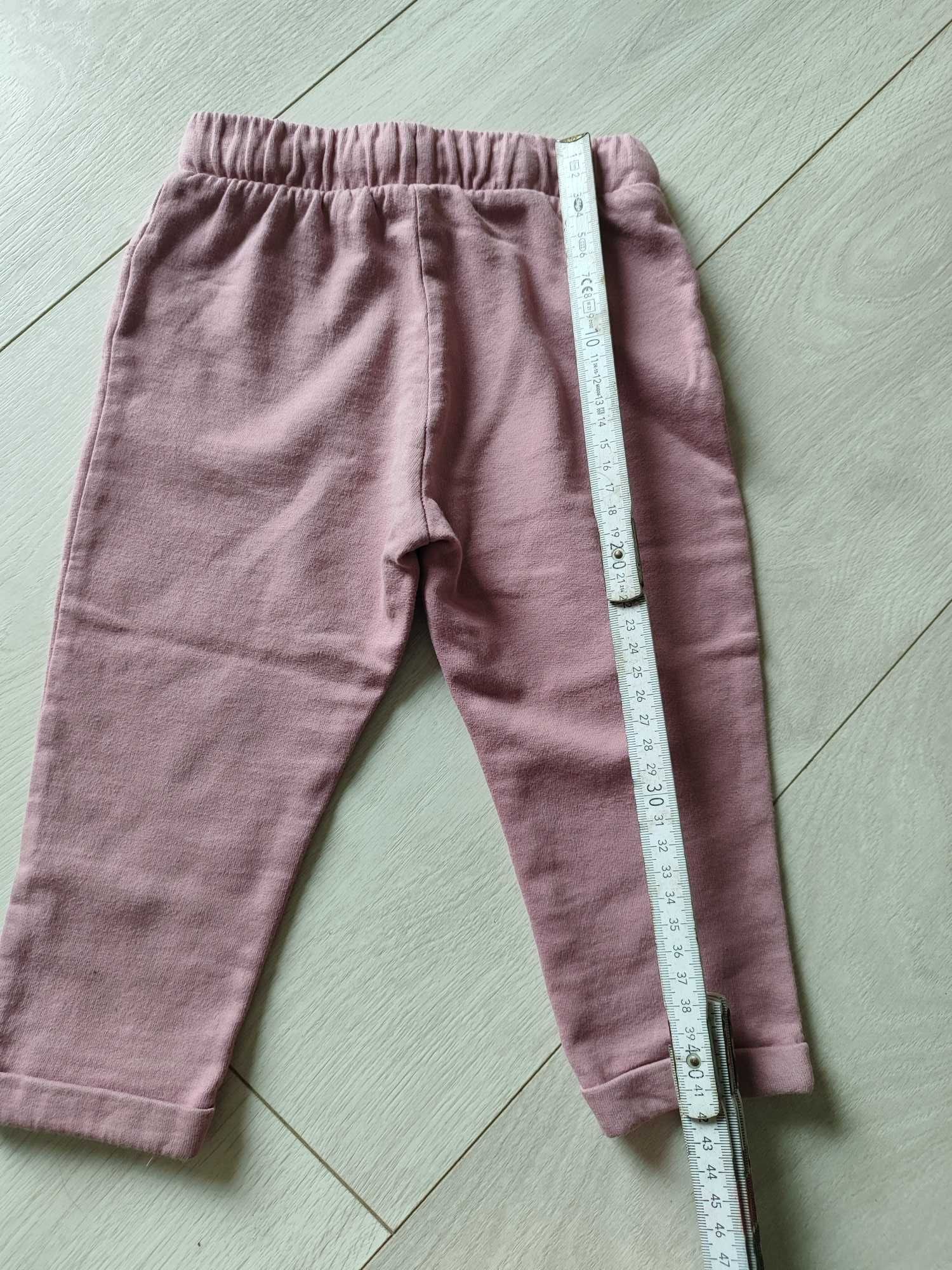 Bawełniane różowe spodnie z pieskami rozm 86