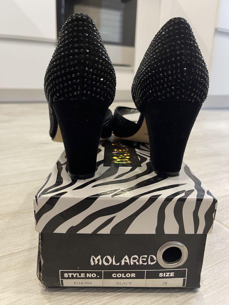 Продам женские нарядные туфли фирмы Molared.