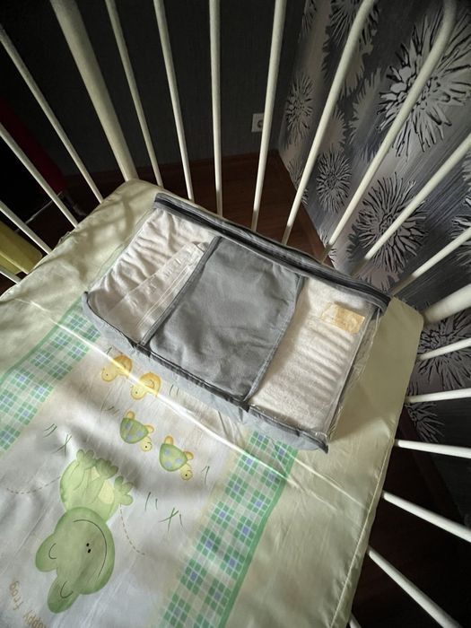 Дитяче ліжечко металеве