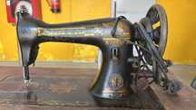 Máquina de costura singer