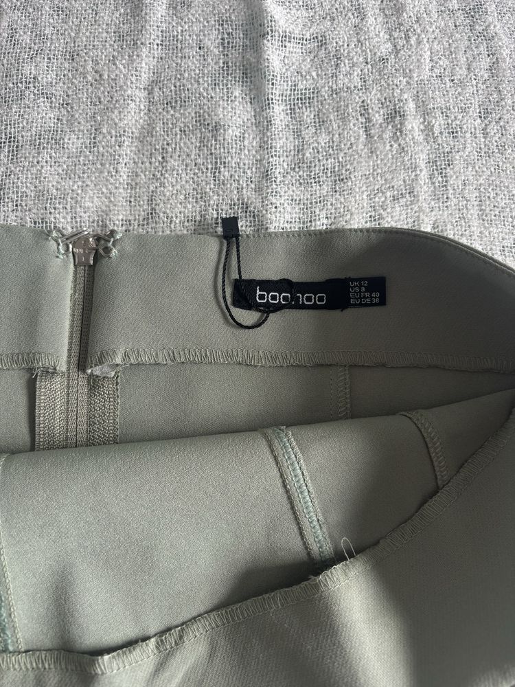 Pistacjowy nowy bez metki top bardzo ladnie sie prezentuje uniwersalny