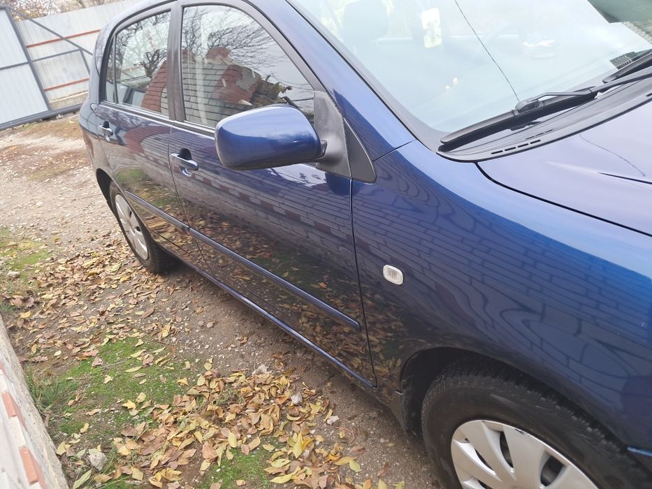 Тойота корола е120