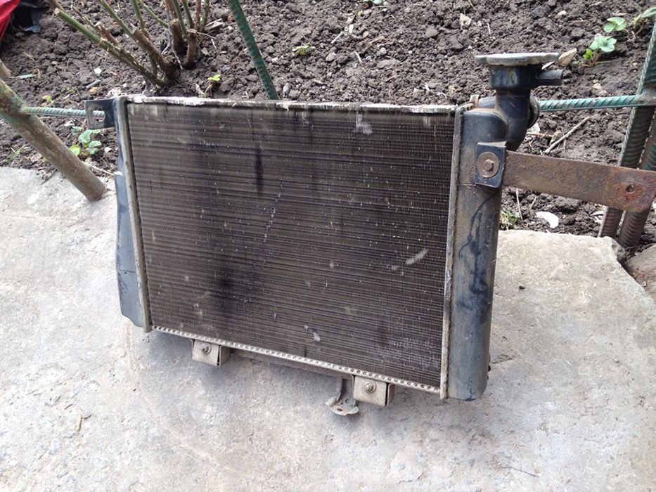 Продам радіатор + вентелятор охолодження Nissan cherry