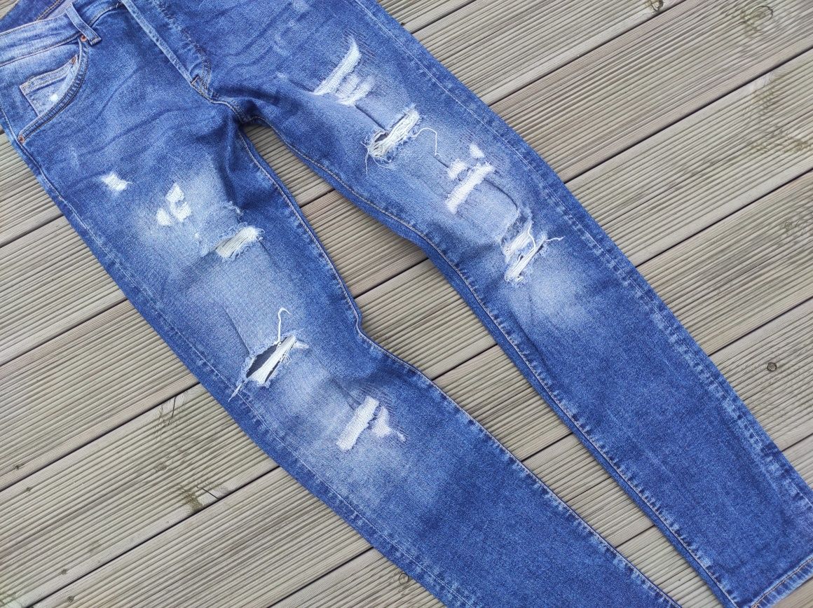 H&M - spodnie jeansowe, jeansy, rurki z przetarciami- 32/175