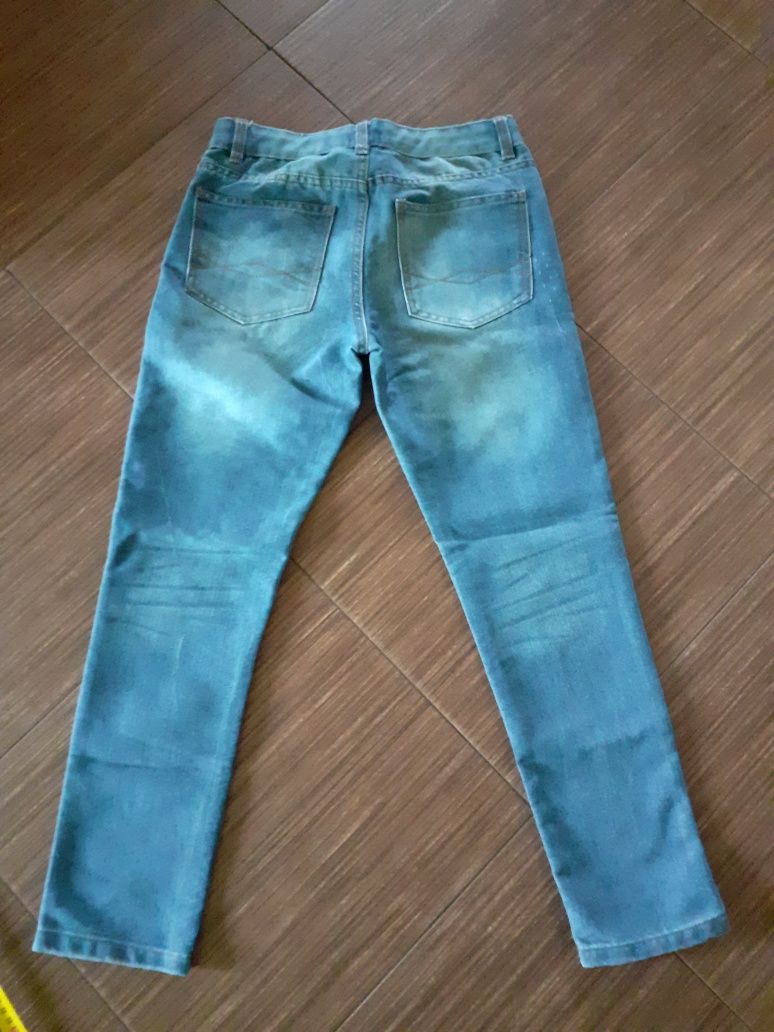 Spodnie wycieruchowe dla chłopaka roz 152 w kolorze niebieskim