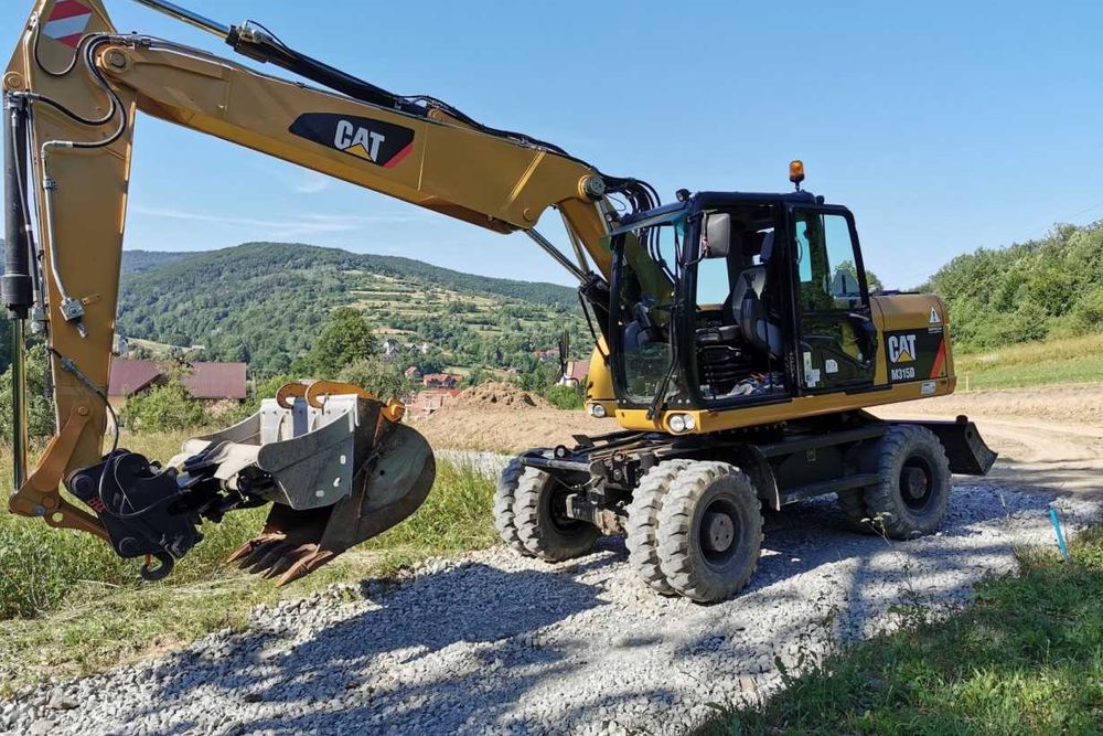 Wynajem usługi koparka kołowa + system 3D