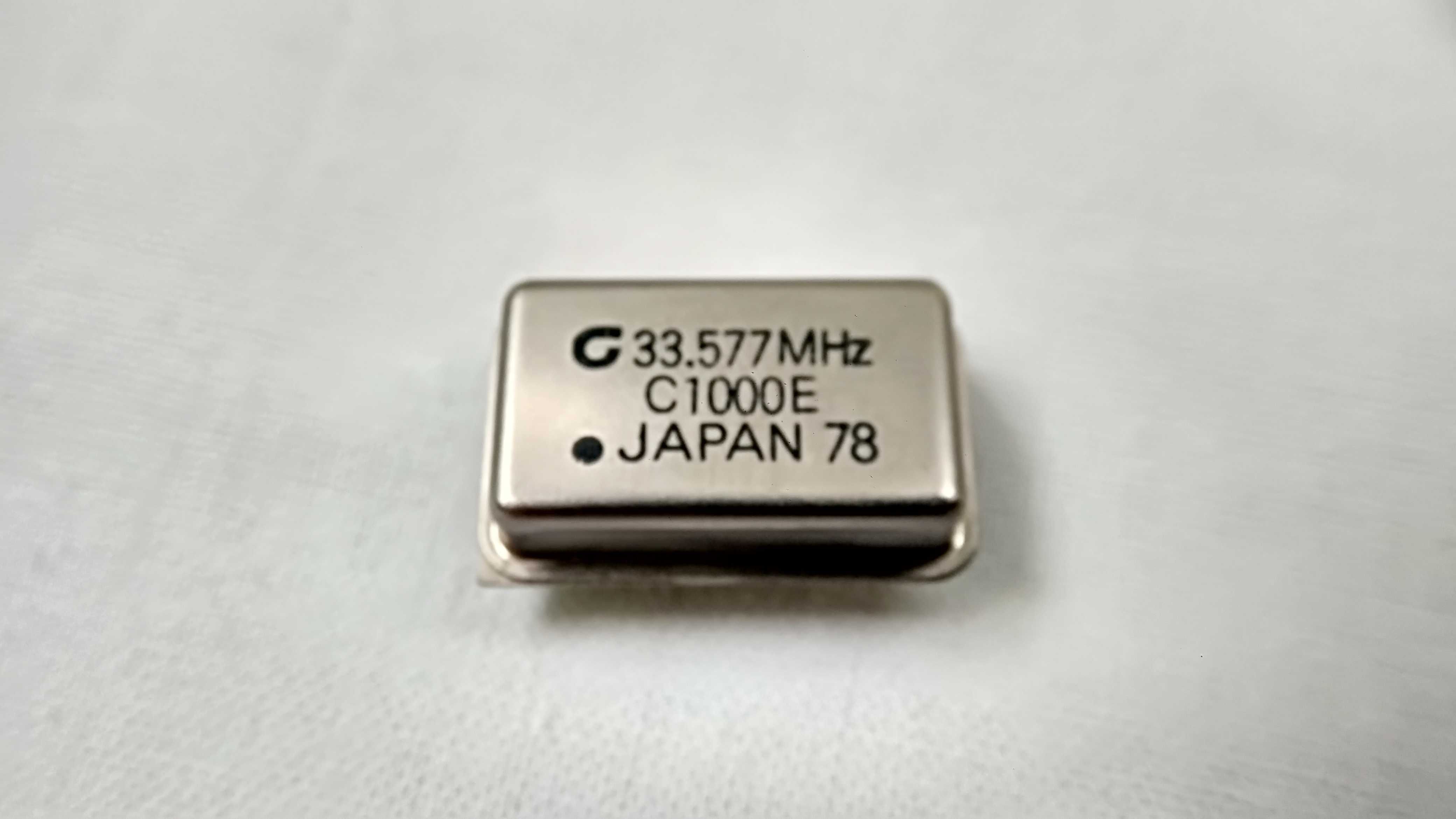 Кварцовий генератор C1000E 33.577Mhz JAPAN 78