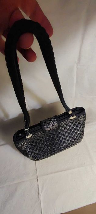 Mala de tiracolo senhora vintage, com bastante uso.