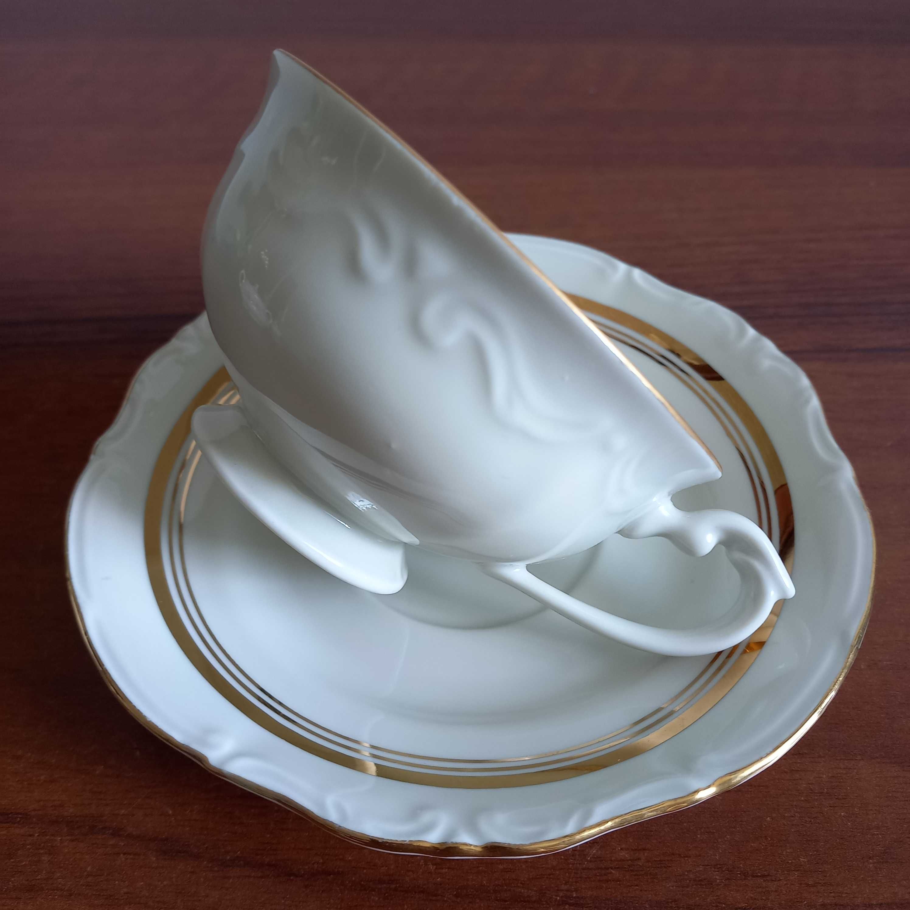 Filiżanka z podstawkiem porcelana Chodzież ze zloceniem.