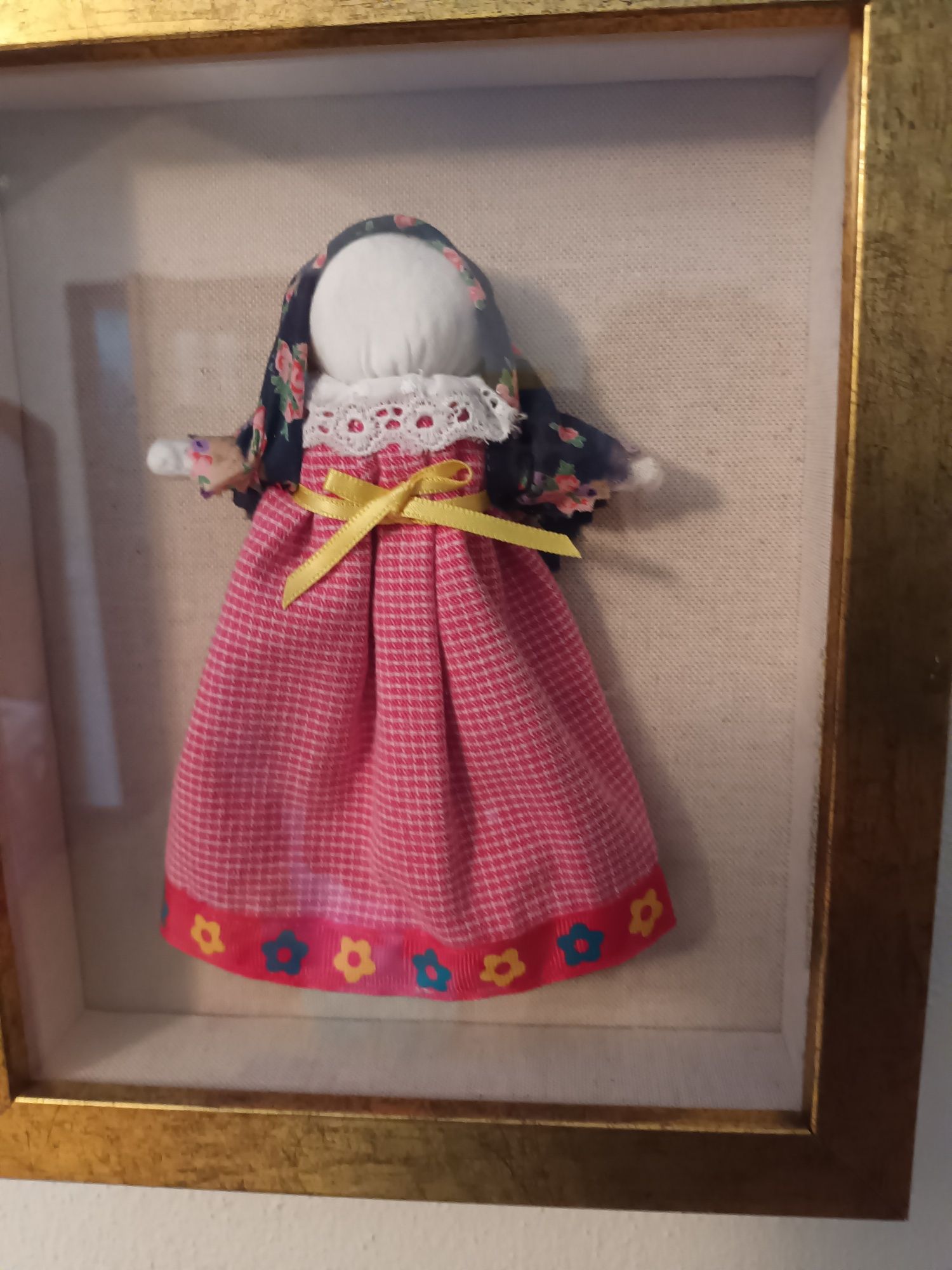 Quadro com boneca
