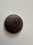Tres moedas comemorativas