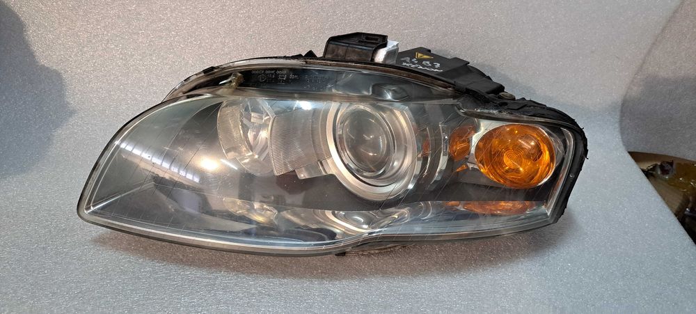 Lampa lewa Xenon Audi A4 B7 żarnik przetwornica kpl