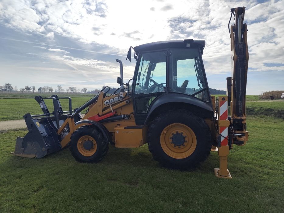 Koparko ładowarka case JCB cat