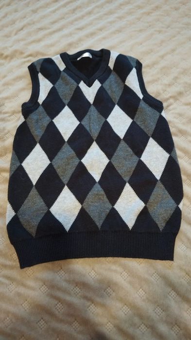 Elegancki sweter bezrękawnik 122