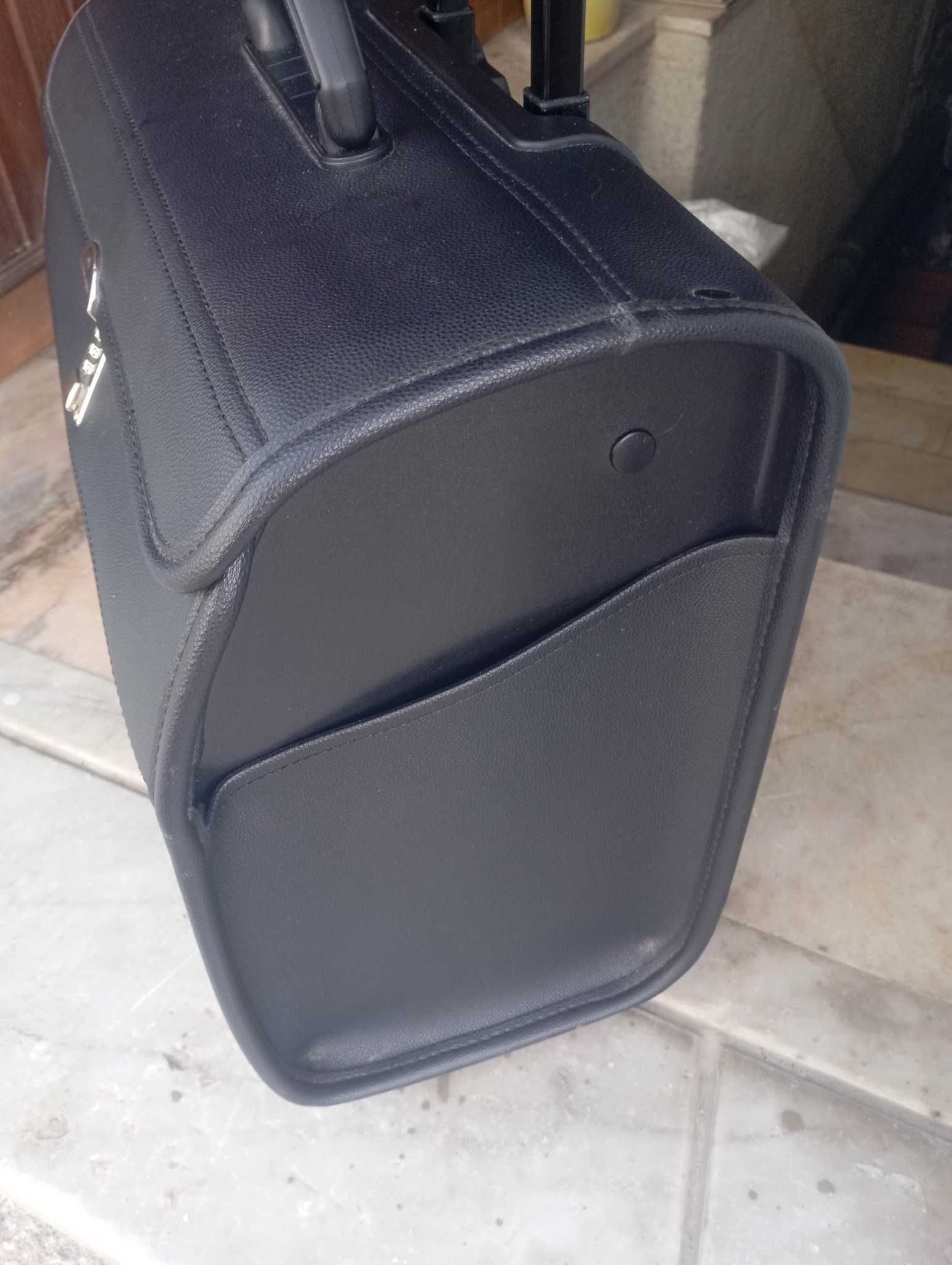 bonita mala preta com rodas em pele genuína da marca SAMSONITE.