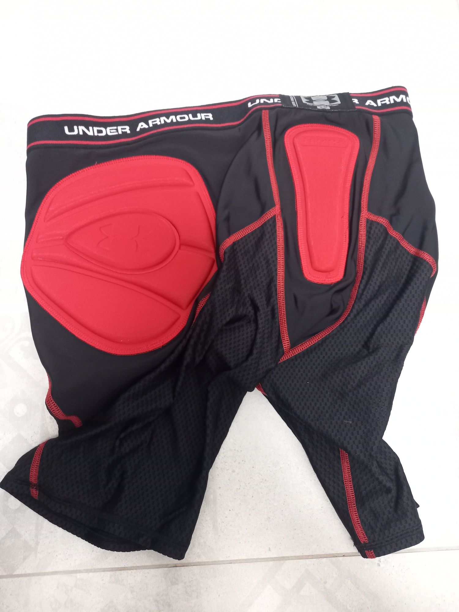 Under armour mpz spodenki podspodenki ochraniacze r. L