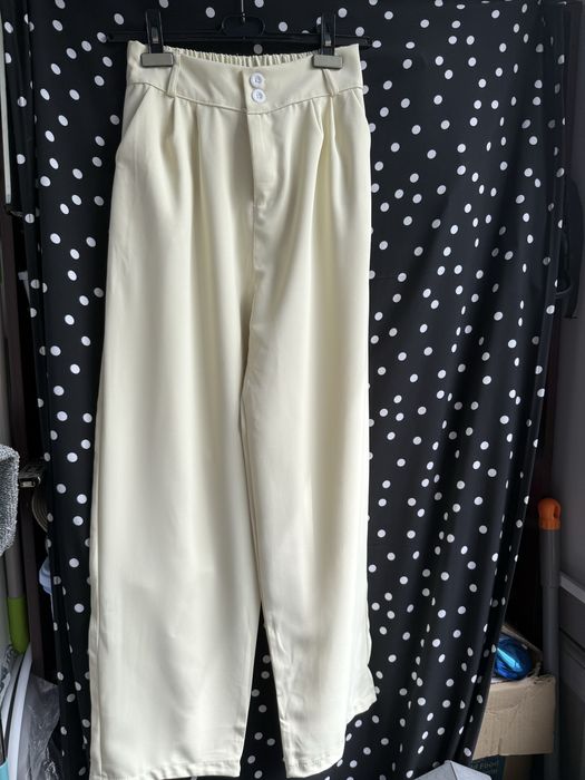 Бежеві жіночі штани нові!