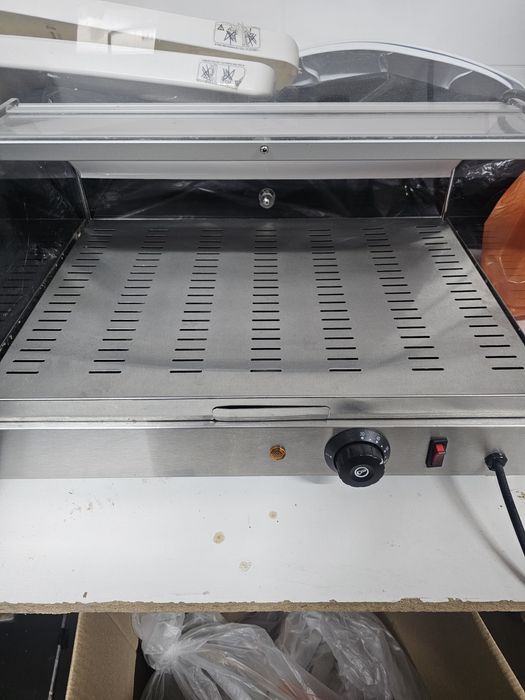 Vendo  vitrine expositira aquecida