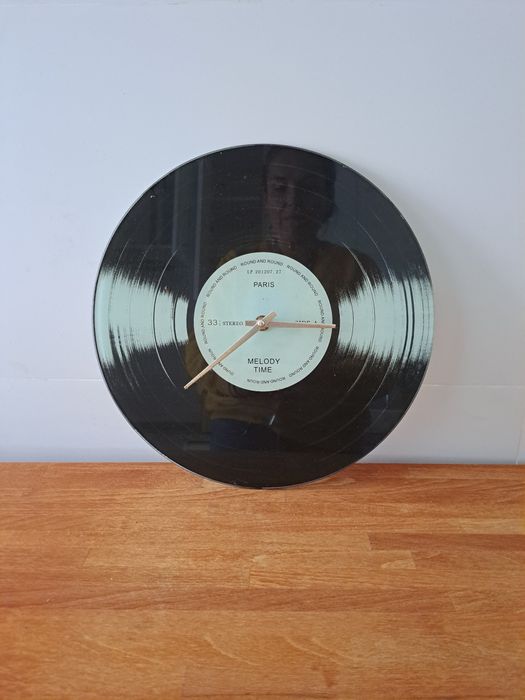 Relógio de parede em forma de vinil