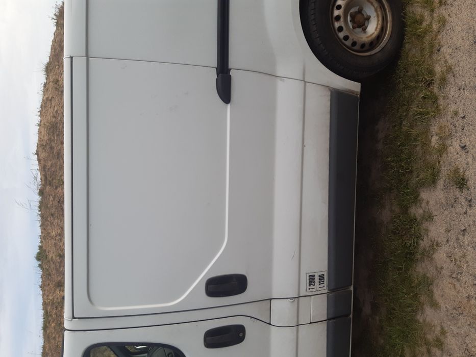 Drzwi przesuwne boczne bok lewe kompletne Opel Vivaro Trafic II  częśc