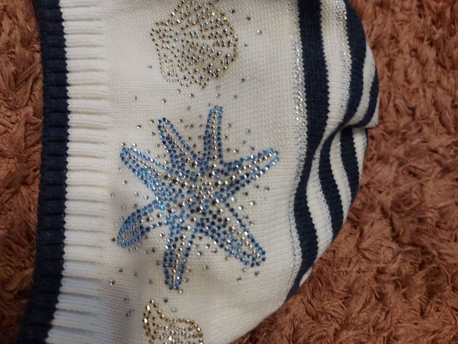 Демісезонна шапка для дівчинки Nikola