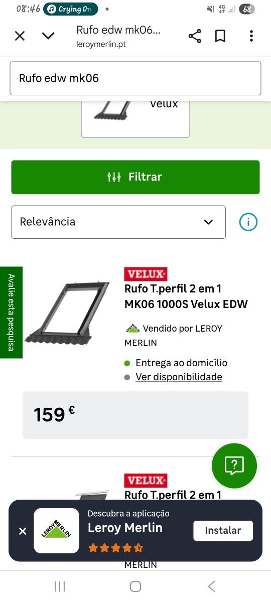 Janela VELUX com cortina e rufo
