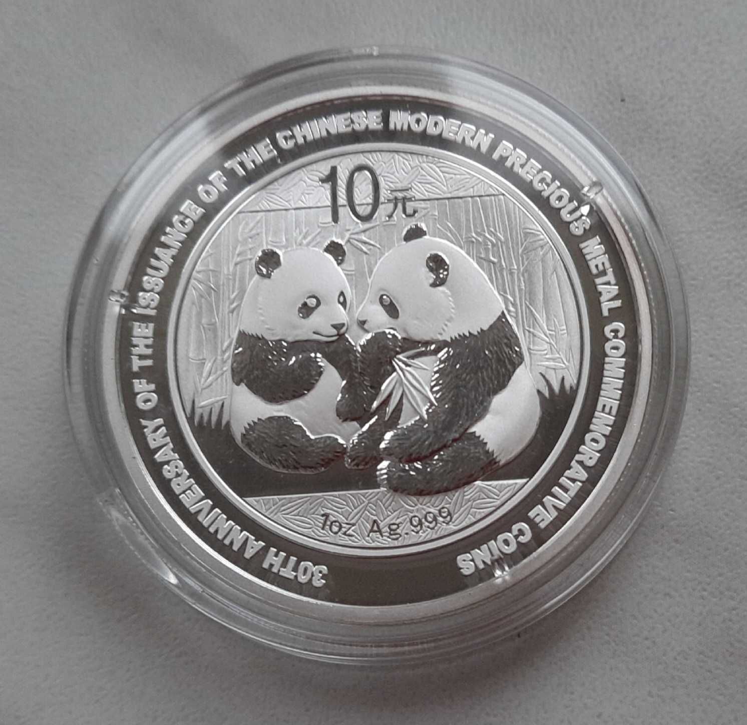 Srebrna chińska moneta z 2009 roku - 10 yuan - 2 pandy