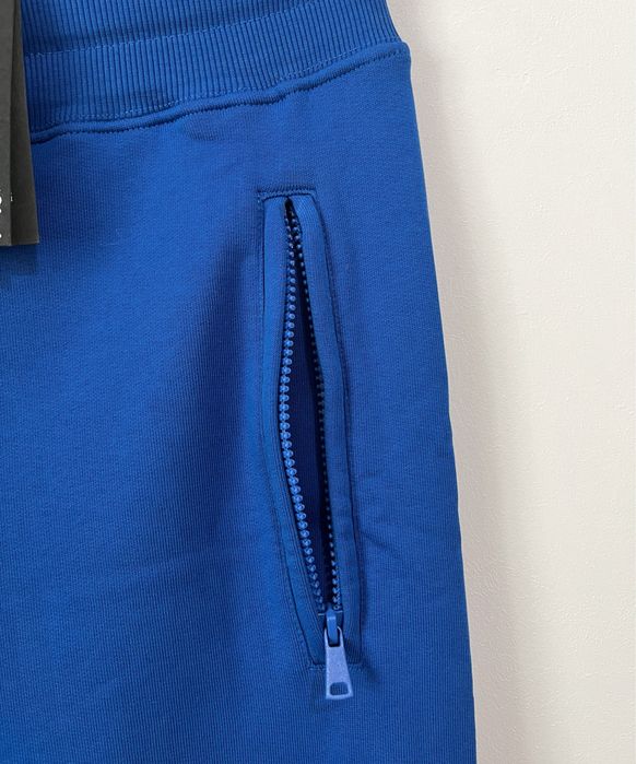 Spodnie Versace sportowe . Rozm M . Original