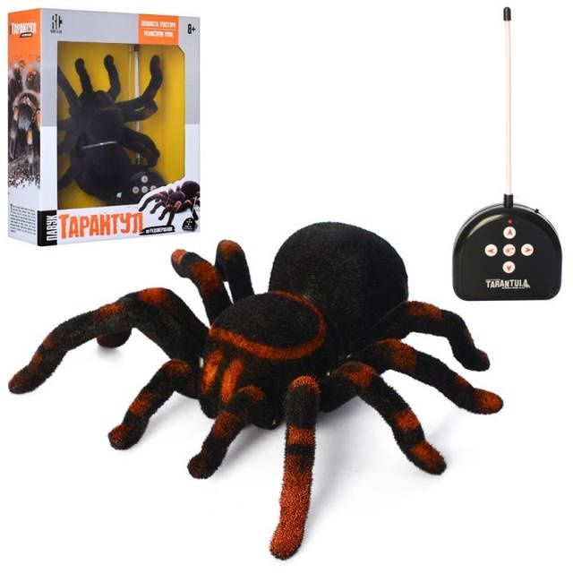 Тарантул, павук на радіокеруванні зі світлом на пульті рухається робот