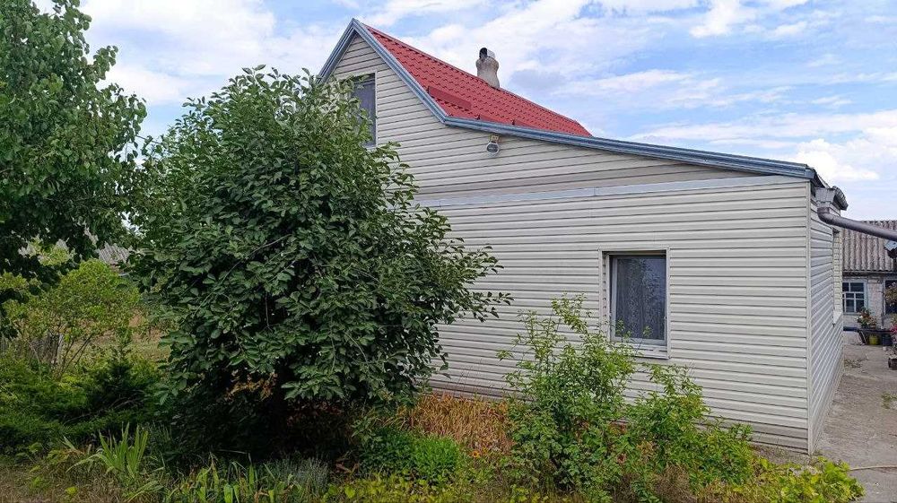 Продам дом в Подгородном с отличным участком