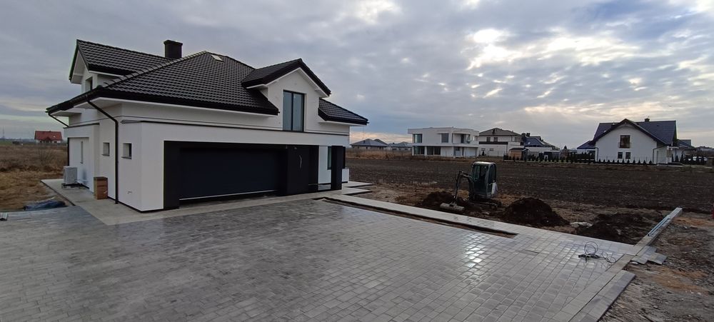 Układanie kostki brukowej brukarstwo odwodnienia równanie terenu