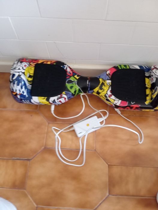 Hoverboard usado em pleno funcionamento com carregador original