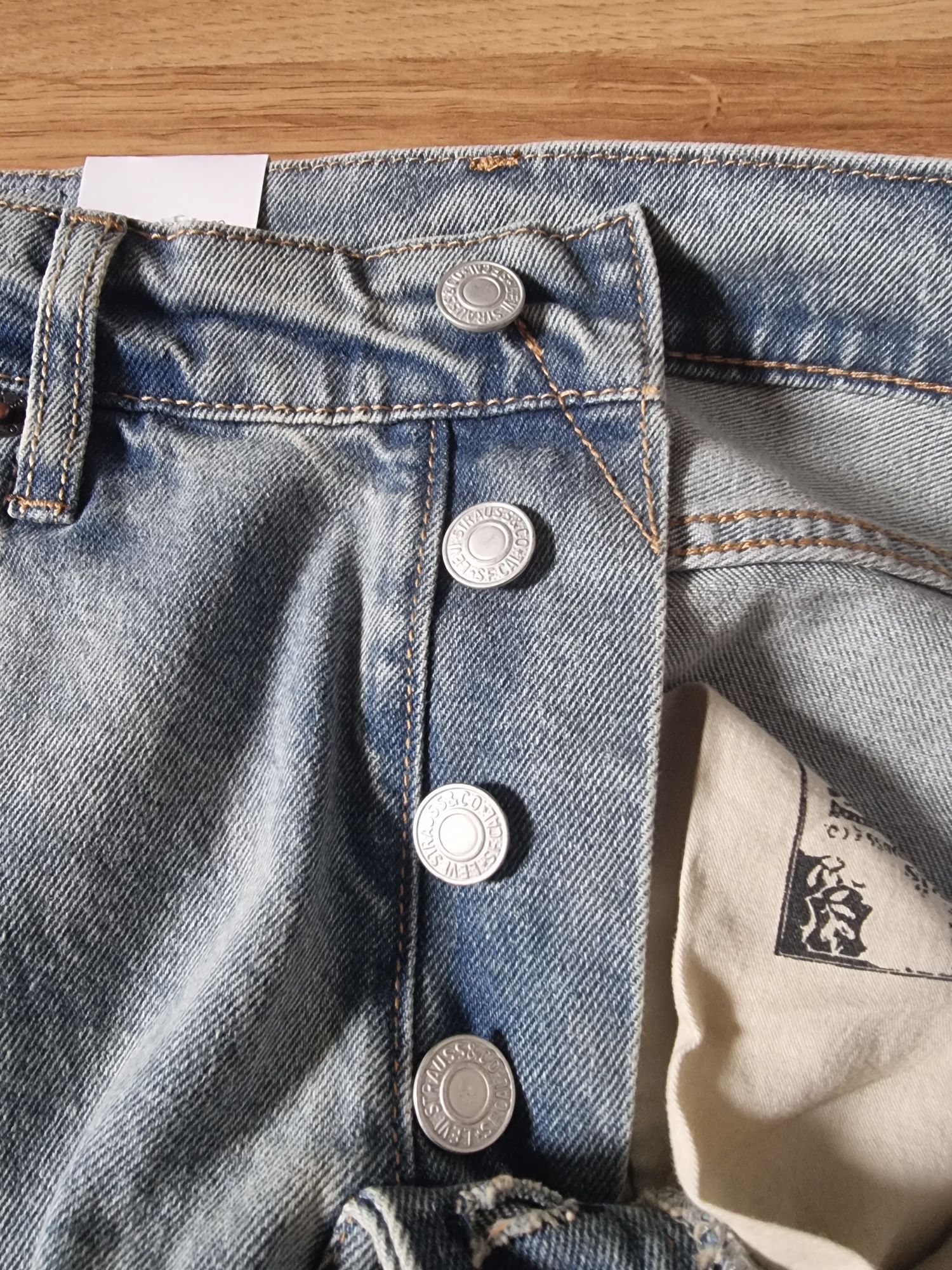 Spodnie jeansowe jasno niebieskie levis 501 W31 L32