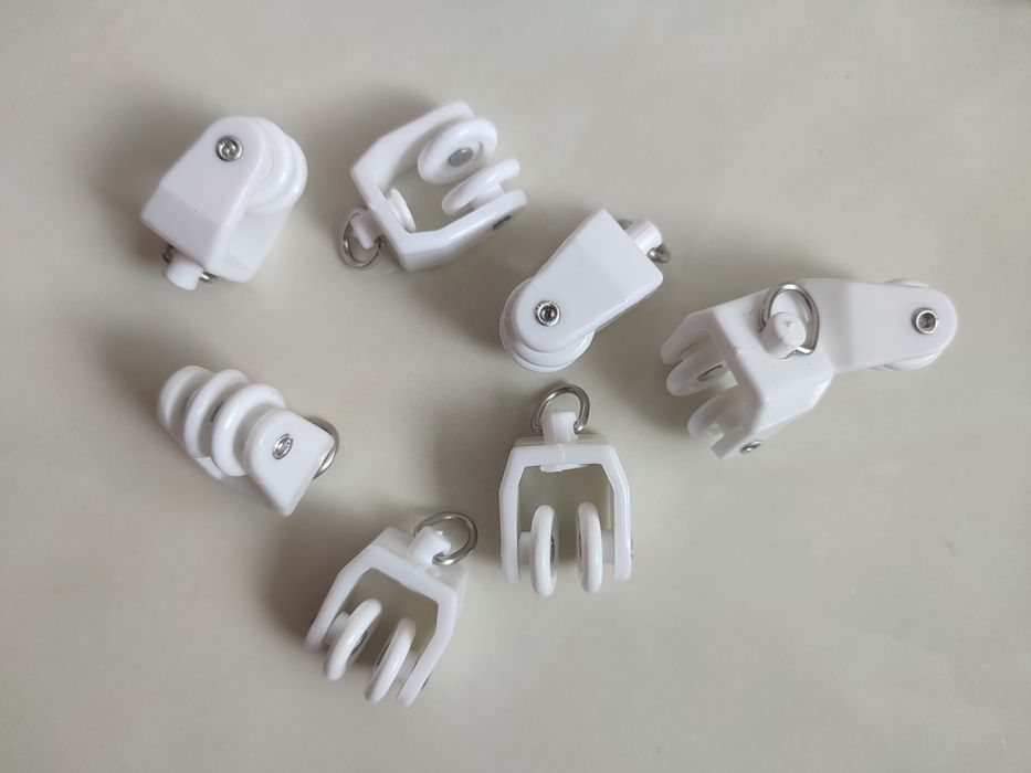 Бігунки до рейкового карнізу для штор